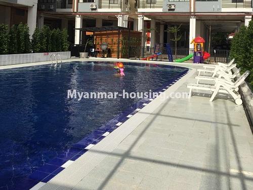 Myanmar real estate - for rent property - No.4621 - Two bedroom Royal Thiri Condominium room for rent in Insein! - another view of swimming pool