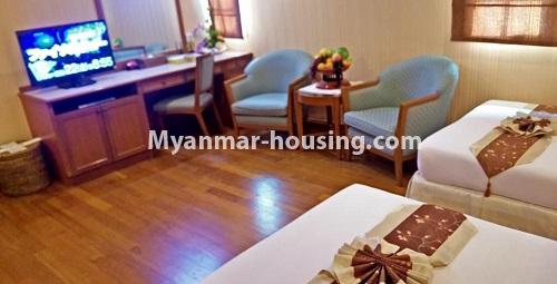 Myanmar real estate - for rent property - No.4345 - Studio room serviced apartment for rent in Kamaryut! - living room area and bed views