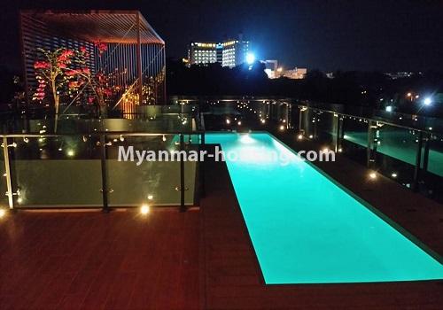 Myanmar real estate - for rent property - No.4517 - Half and three storey house with swimming pool, lift and full facilities for rent in 8 Mile, Mayangone! - swimming pool night view