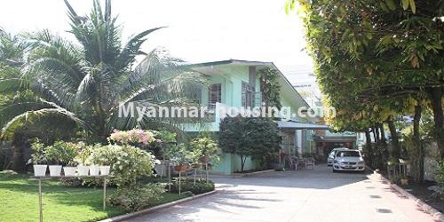 Myanmar real estate - for rent property - No.4725 - Half and one storey landed house with large yard for rent in Yankin - house and compound view