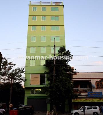 ミャンマー不動産 - 賃貸物件 - No.4780 - Half and 8 storey hall type building for rent on Strand Road, Kyeemyintdaing Township. - front view of the building